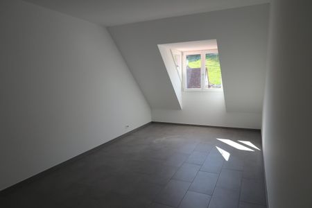 Neuwertige Maisonette Dachwohnung im Dorfkern - Photo 3