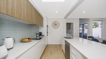 Coastal Luxury Meets Effortless Family Living - Photo 2