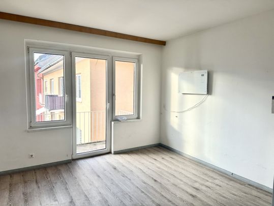 Gemütliche 2-Zimmer-Wohnung mit Balkon und Stadtblick im Zentrum von Knittelfeld! - Photo 1