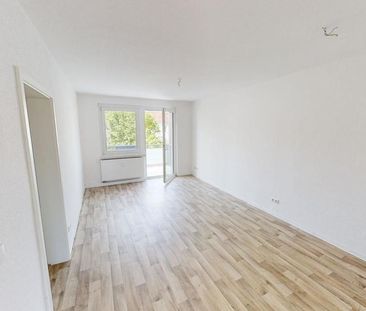 Attraktive 3-Raum-Wohnung mit Einbauküche - Foto 2