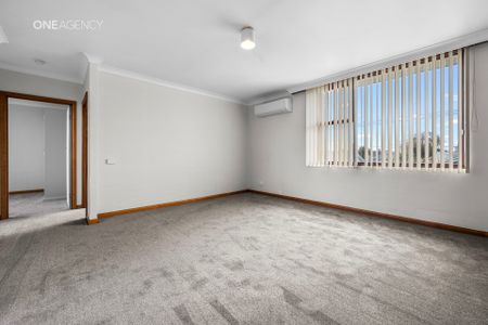 Top Floor, Prime Location, Easy Living! - Photo 2