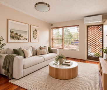 IDEALLY POSITIONED 1ST FLOOR UNIT - Photo 1