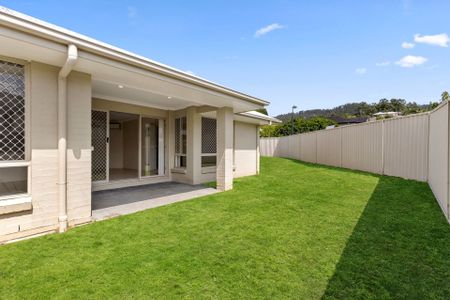 Spacious Family Living in the Heart of Upper Coomera - 4-Bedroom Home with Modern Comforts. - Photo 5