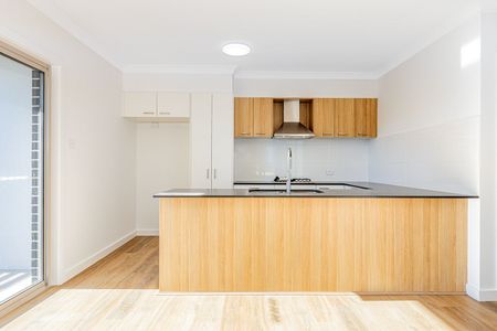 Modern Comfort Meets Quality Design - Brand New Low-Maintenance Family Home - Photo 4