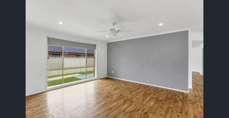 Large, modern 4-bedroom family home on corner block - Photo 4