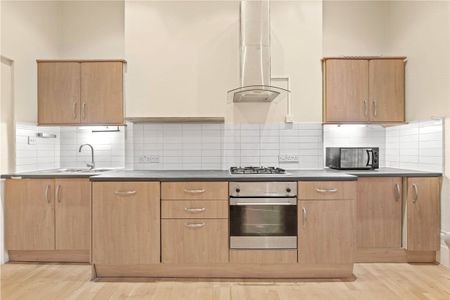 This raised ground floor one-bedroom apartment is a good size and includes an open kitchen reception. The circular bedroom is a spacious double and includes a dressing room, all in the beautiful Grade II listed Royal Crescent with access to communal gardens. EPC rating D - Photo 3