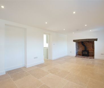 A beautifully refurbished brick and flint cottage combining charmin... - Photo 2