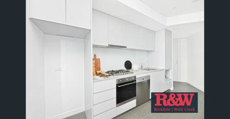 Modern 1-Bedroom Apartment in the Heart of Discovery Point - Photo 4