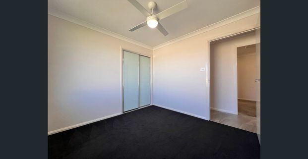 NEAR NEW 4 BEDROOM HOME - Photo 1