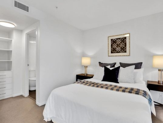 Modern Inner-City Living with River Views at Skyring Apartments - Photo 1