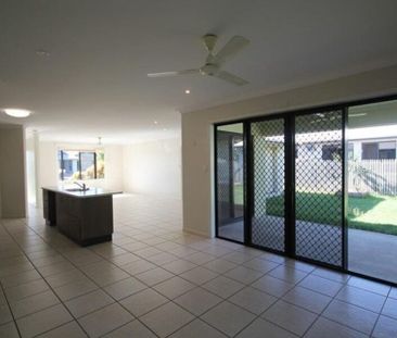 Nestled in Bushland Beach&colon; a 4-Bedroom Modern Comfort Home - Photo 1