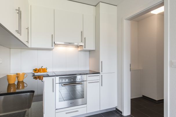 Grün trifft Behaglichkeit - Ihre Erdgeschosswohnung mit Gartensitzplatz! - Photo 1