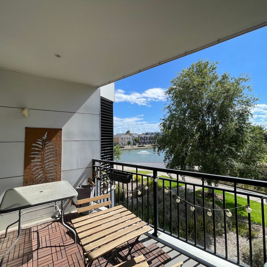 Perfectly Located with Reserve and Lake Frontage - Modern Stylish Living - Photo 1