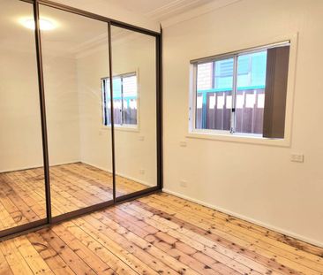 FULLY RENOVATED 3 BEDROOM HOME IN GREAT LOCATION - Photo 4