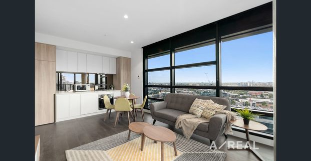 Stylish City Living: Modern 2-Bedroom Apartment with Stunning Views in West Melbourne - Photo 1