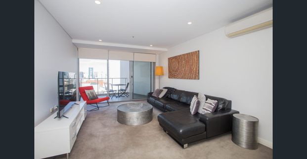 Neat as a pin fully furnished apartment with city views. - Photo 1