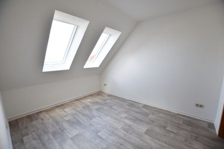 Maisonettewohnung im Zentrum von Warsingsfehn - Photo 3
