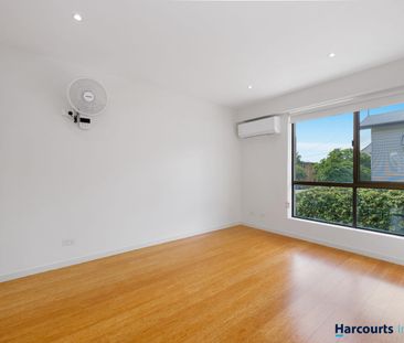 This double storey townhouse will not disappoint! - Photo 2
