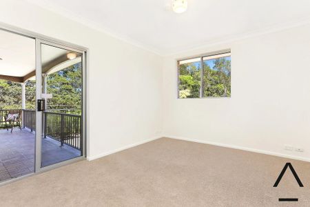 Expansive Six-Bedroom Home in Peaceful Riverside Pocket - Photo 3