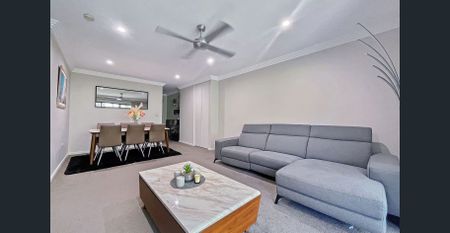 Rare, Private, 2 Bedroom unit with large, 3 car garage! - Photo 2