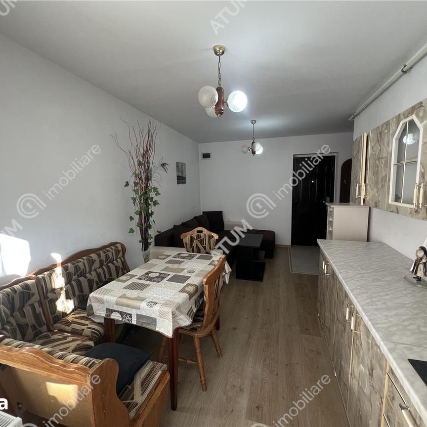 Garsoniera decomandata etaj 1 si loc de parcare zona Turnisor - Fotografie 1