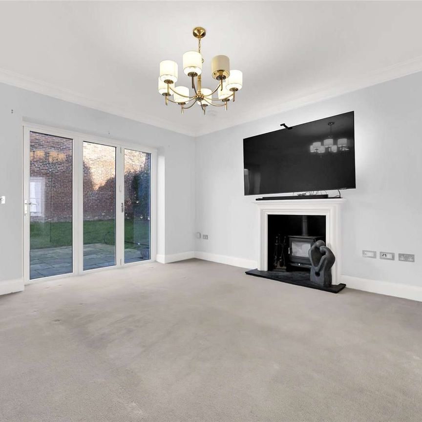 A beautifully appointed five bedroom detached home by PH Homes, set within an exclusive Alderley Park development and extending to over 2,250 sq ft across three floors - Photo 1