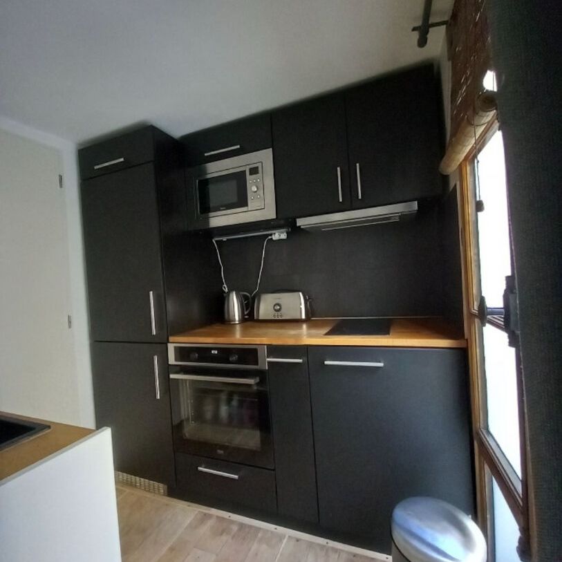 Appartement Paris 1 pièce(s) 17 m2 - Photo 1