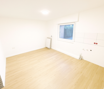 Erstbezug nach Renovierung! 2ZKB EG-Wohnung in ruhiger Lage - Foto 1