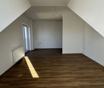 Helle 1-Zi.-Dachgeschosswohnung mit Ausblick - Foto 1