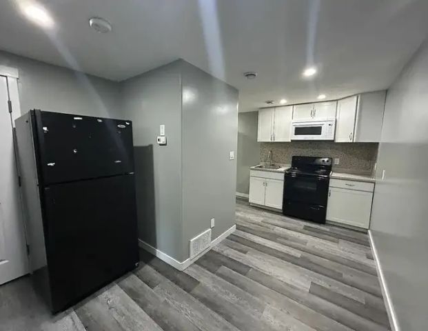Cozy 2 Bedroom 1 Bathroom Basement Suite with Spacious Fenced Yard*Pet Friendly! | 8570 Cushing Place Southwest, Edmonton - Photo 1
