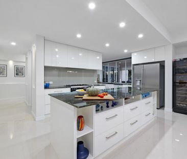 EXCLUSIVE LAKEFRONT LUXURY WITH PANORAMIC GOLF COURSE VIEWS - Photo 3