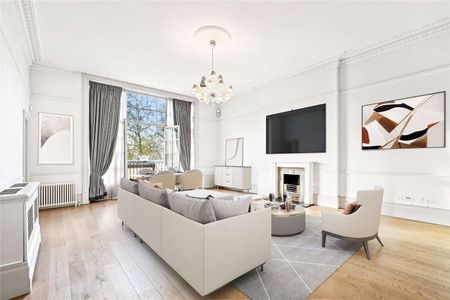 A beautifully presented and spacious three bedroom apartment. - Photo 4