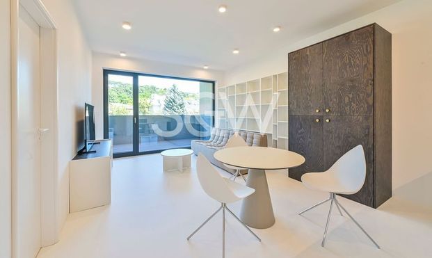 SVOBODA & WILLIAMS | 105387 | Slnečný dizajnový 2i byt s balkónom, výťahom a parkovacím miestom v garáži - Fotografia 1