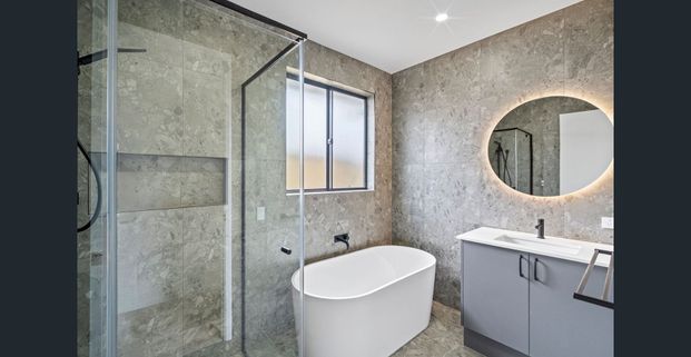 Brand New 4 Bedroom Home with Dual Masters in Covella Estate - Photo 1