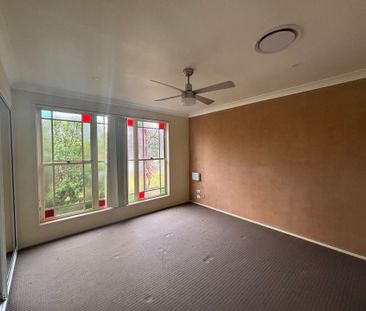 Big Family Home, No Mowing Required! - Photo 1