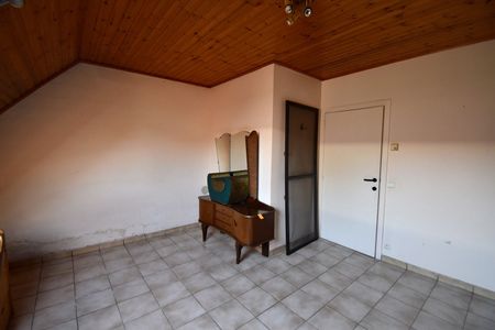 Polyvalent gebouw bestaande uit winkelruimte, appartement en loods - Photo 5