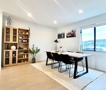 Modern 3-Bedroom Home in Sought-After Waiata Shore - Photo 5