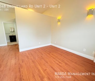 NEWLY RENOVATED 1-BEDROOM/1-BATH MAIN FLOOR SUITE +HYDRO - Photo 4