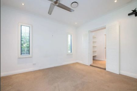 Elegant Stucco Double Brick Home with Character and Modern Comfort - Photo 5