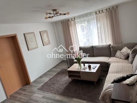 3-Zimmer-Dachgeschosswohnung mit großer Wohnküche in ruhiger Lage - Photo 2