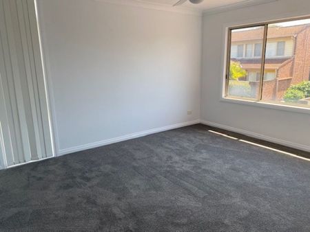 Two Bedroom Townhouse in Ideal Location - Photo 2