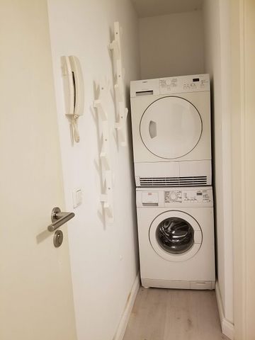 Terrassenwohnung mit Designer-Möblierung in Köln - Photo 4