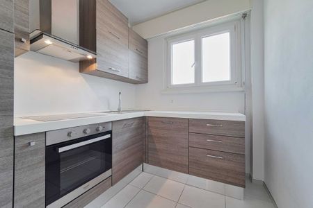 LUMINOSO ATTICO DI 4.5 LOCALI COMPLETAMENTE RINNOVATO - Photo 5