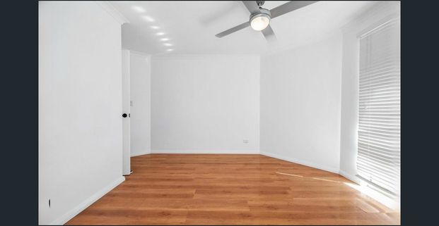 Spacious 4x2 Family Home with Coastal Charm - Photo 1