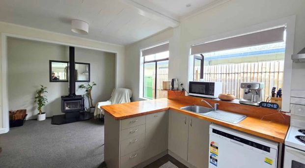 Summer Ready! Spacious Family Home with Pool and Double Garage - Photo 1