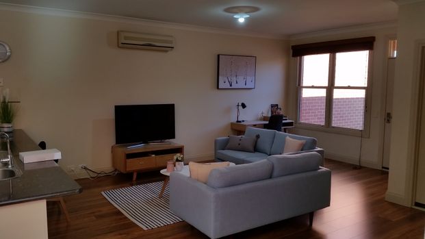 Fully Furnished Central Gem - Photo 1