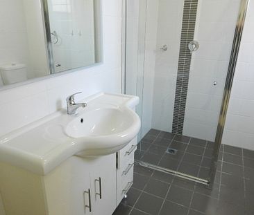 NEW Timber floor in the Bedroom and Tiled Living Space - Photo 4