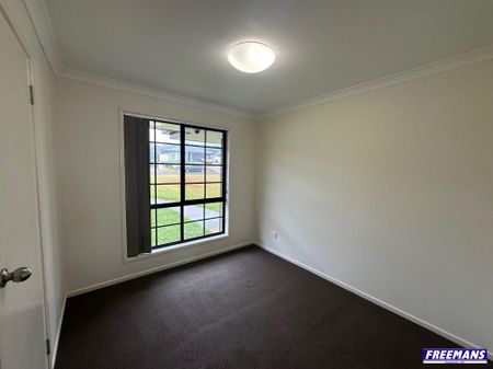 Modern Fully Fenced 4 bedroom Home - Photo 5