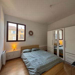 LOCATION APPARTEMENT SAINT GENIS LAVAL EN DUPLEX de 36m2 avec jardin - Photo 2