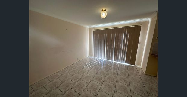 Cute and Cozy Three-Bedroom Home - Photo 1